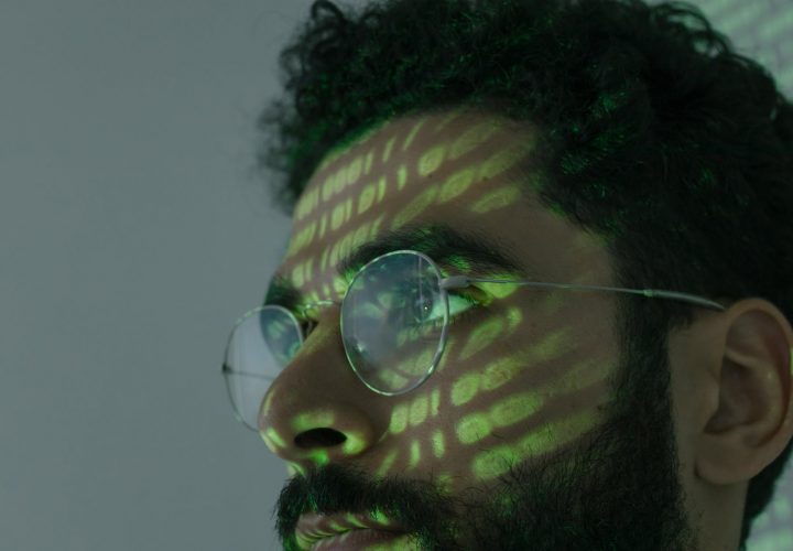 man wearing silver framed eyeglasses